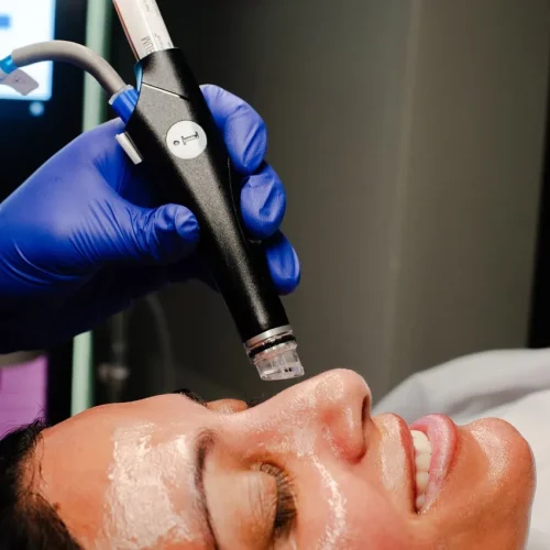 Beauty Woman receiving a HydraFacial Treatment at Nona Med spa